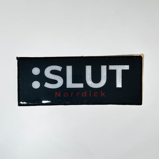"Sl*t" Norrdick tag